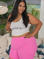 Curvy mature babe in tight pink shorts teasing big booty solo pose