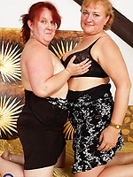 Mature nude duo showing saggy tits, hairy pussy and big booty in spread pose, dildo tease