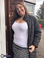 Smiling busty milf flashes tits and curves