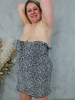 Mature blonde with big natural tits playing with black dildo