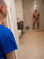 Mature nude cougar shows hairy pussy and natural tits giving head in steamy shower