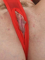 Milf solo tease in sheer red lingerie, natural tits, hairy pussy, dildo play