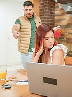 Redhead tease gets pounded deep right on the kitchen table