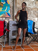 Slender babe slowly strips down and shows off her hairy body