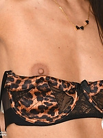 Naked solo tease in leopard garter with black stockings, spread pose and shaved pussy