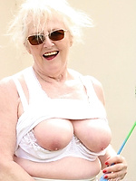 Naked granny with glasses is uploading her granny porn photos in our free gallery