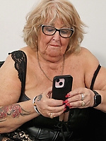 Mature milf with saggy tits and big booty in black stockings teases raw facesitting