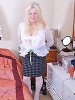 Granny has loves using toys and posing for mature gallery