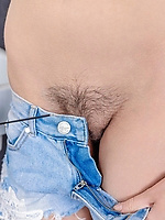 Skinny babe flaunts hairy pussy