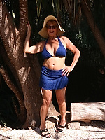 Mature nude solo tease outdoors with natural tits, hairy pussy and spread pose