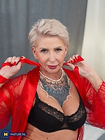 Mature nude tease with natural tits and pussy out in red lace robe