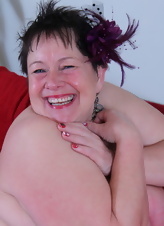 Short-haired 55-year-old BBW isn't shy to show fat body in mature pics
