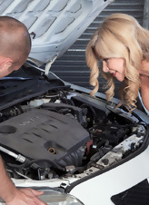 Buxom mature blonde thanked mechanic for quick car repair