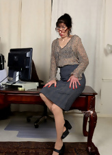 Crazy mature secretary shows small tits and cunt in office