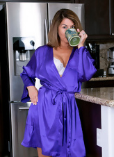 Pics of sexy housewife getting naked after cup of coffee