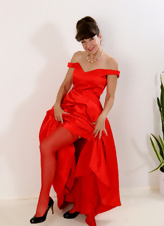 Gorgeous house wife takes off beautiful red dress in pics