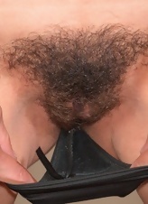 MILF with small-tits has a hairy cunt that she wants to show