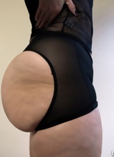 Mature British goddess has big butt and silicone tits
