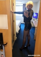 British MILF with big tits shows how many outfits she has