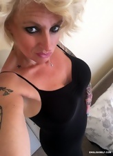 Sexy MILF from the UK isn't going to hide big tits from guys