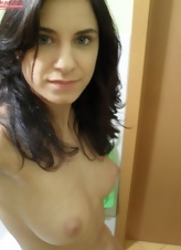 Happy brunette MILF undresses and takes some sexy selfies