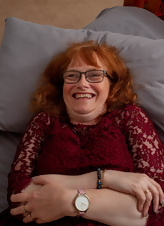 Excited redhead with glasses needs glass dildo to reach orgasm
