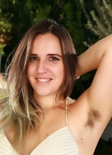 Joyful mom shows her hairy pussy and armpits in the fresh air