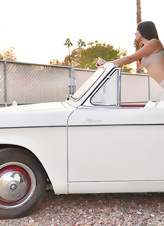 Sex-machines pics of beauty in lingerie posing on cabriolet