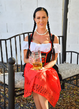 Nice outdoor pics of MILF with big tits who adores Oktoberfest