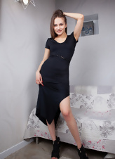 Hot pics of clothed MILF freeing slender body from black dress