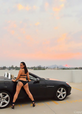 Brunette mom dreams about rough sex while posing near the car