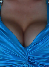Stunning blond lady takes off blue dress exposing her big tits