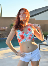 Solo pictures of svelte redhead flashing boobs under the sun