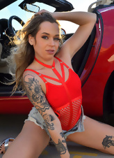 Pretty MILF dreams about rough sex while posing outdoors by car
