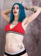 Pics of mom with blue hair undressing to display hairy pussy