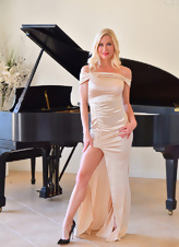 Great MILF sex pics of stunning blonde undressing by the piano