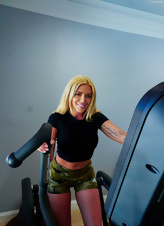 Busty blonde mature gladly undresses during fitness at home
