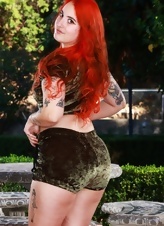 Red-haired mom in sexy shorts displays her sweet bush outdoors