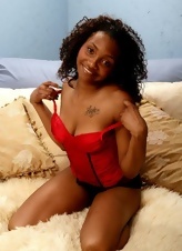 Joyful Ebony mom strips naked in order to show her hairy cunny