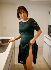 Asian housewife showing her eager MILF cooch with legs spread
