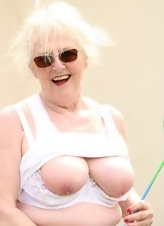 Naked granny with glasses is uploading her granny porn photos in our free gallery