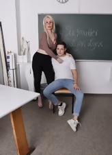 MILF teacher lets a student pound her while still in class