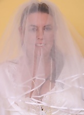 Mature Bride In White Lingerie Poses