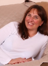 Busty Milf Strips On Couch Gallery