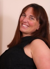 Mature With Big Tits Striptease Pics