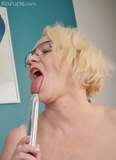 Busty Blonde Mature Striptease Pics