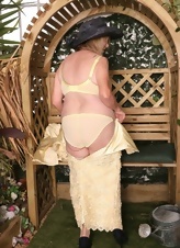GILF Garden Tease In Yellow Dress Pics
