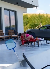 Lesbian Poolside Pink Suit Pussy Pics