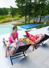 Lesbian Poolside Pink Suit Pussy Pics