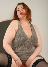 Mature Redhead Flashing Panties Bedroom Gallery